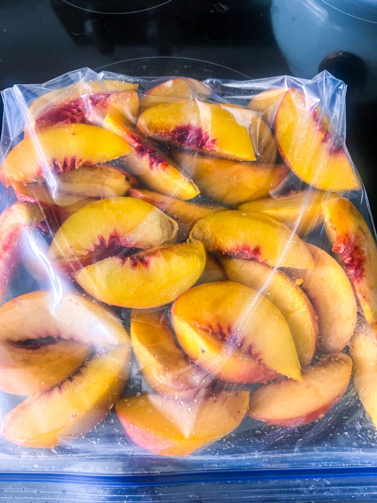 frozen peaches in a gallon freezer bag