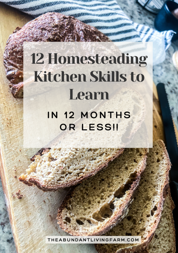 12 Homesteading Kitchen Skills to Learn in 12 Months or Less banner on top of a picture of freshly milled whole wheat bread sliced on a wooden cutting board with a striped kitchen towel in the background on top of a granite countertop