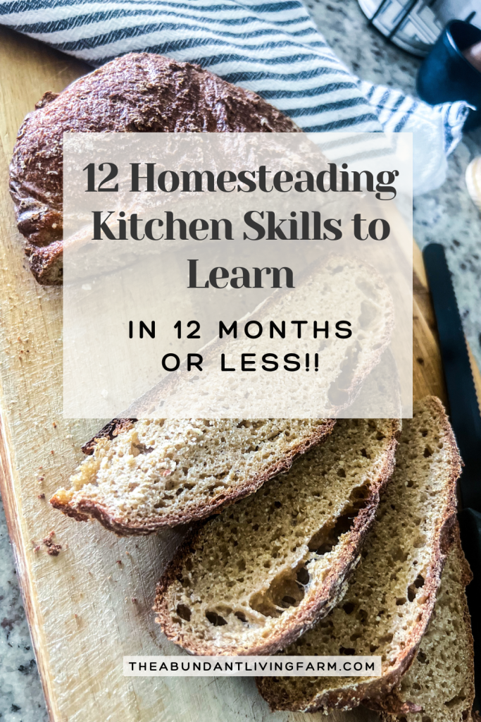 12 Homesteading Kitchen Skills to Learn in 12 Months or Less banner on top of a picture of freshly milled whole wheat bread sliced on a wooden cutting board with a striped kitchen towel in the background on top of a granite countertop